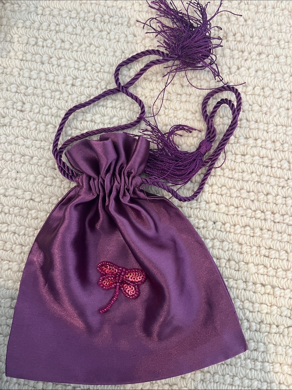 Purple beaded butterfly jewelry holder with drawstring